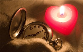 Love heart-shaped candles, pocket watch