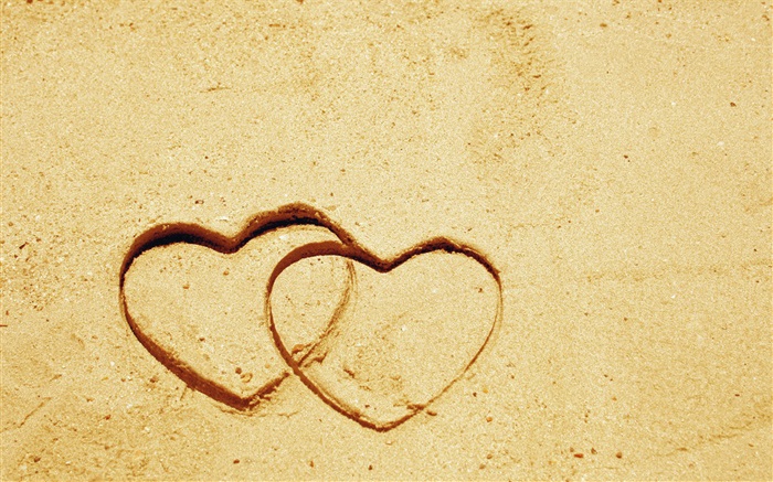 Two love hearts on the sand Wallpapers Pictures Photos Images