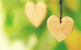 Wooden heart-shaped love