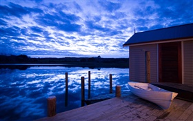 Boathouse, river, clouds, dusk, New Zealand