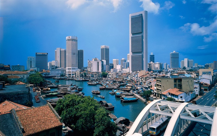 Cityscape, buildings, river, boats Wallpapers Pictures Photos Images