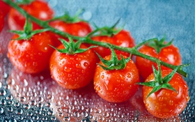 Fresh fruit, red tomatoes, water drops