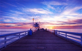 Pier, sunset, clouds, bridge, people