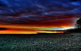 Sunset scenery, river bank, stone, red sky HD wallpaper