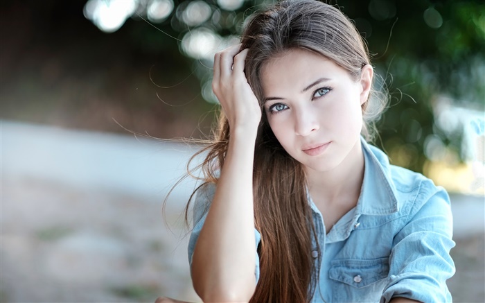 Girl stroking her hair Wallpapers Pictures Photos Images