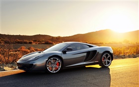Mclaren MP4-12C sports car, sunset, road