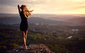 Girl at mountain top, stone, legs, wind HD wallpaper