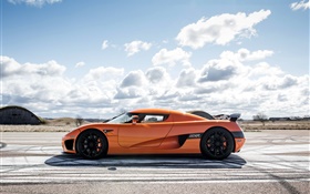 Koenigsegg CCXR orange supercar side view