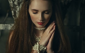 Lovely girl, closed eyes, jewelry