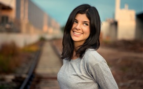 Smile girl, black hair, railway, bokeh