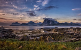 Dusk, lake, grass, rocks, cloudy sky HD wallpaper