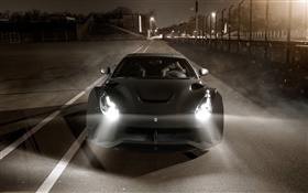 Ferrari F12 Berlinetta supercar front view, lights