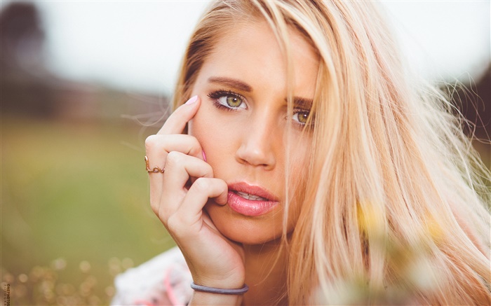Yellow eyes girl, blonde, face, hand Wallpapers Pictures Photos Images