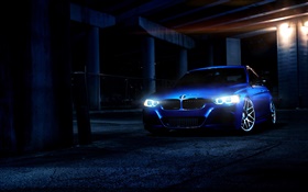 BMW blue car at night, lights