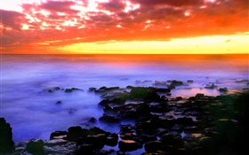 Beautiful red sky, sunset, sea, stones, Hawaii, USA