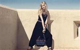 Black dress blonde girl and bag