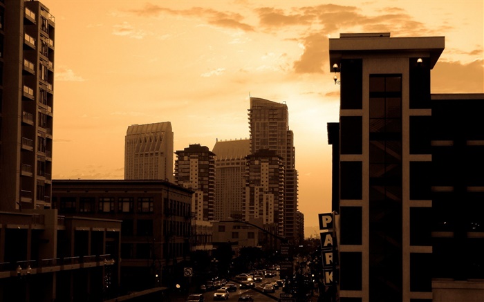 City at dusk, houses, road, traffic, cars, red sky Wallpapers Pictures Photos Images