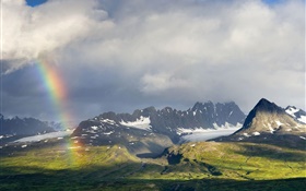 Cloudy sky, mountains, grass, rainbow