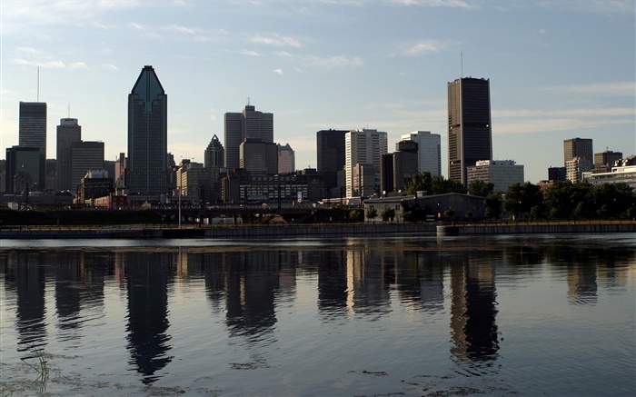 Dusk, city, high buildings, river, water reflection Wallpapers Pictures Photos Images