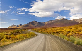 Road, grass, mountains, clouds, blue sky HD wallpaper
