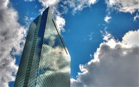 Skyscrapers, clouds, blue sky