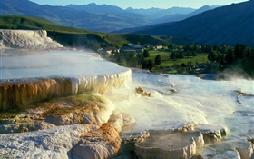 Solar salt terraces, village, mountains