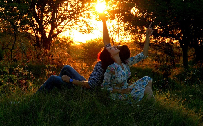 Man and woman, lovers, sun, meadow, forest Wallpapers Pictures Photos Images