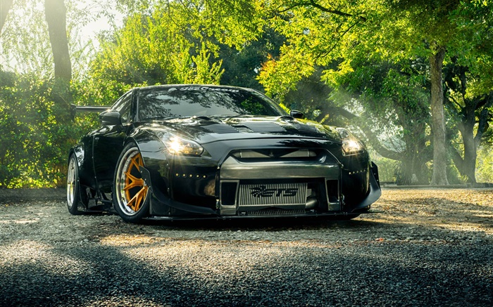 Nissan GT-R R35 black car front view, lights, trees Wallpapers Pictures Photos Images