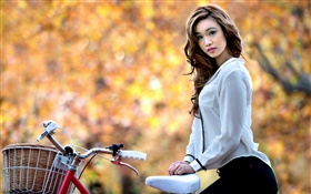 Asian girl and bike in autumn HD wallpaper
