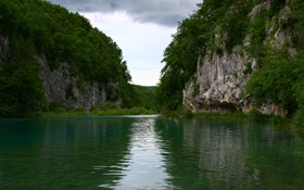 Lake, rocks, mountains, clouds HD wallpaper