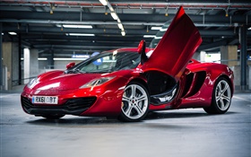 Red McLaren MP4-12C supercar parking
