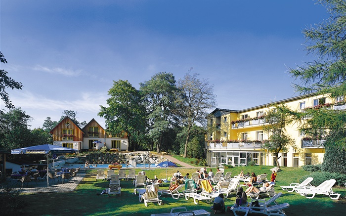 Resort, pool, chairs, houses, trees, people Wallpapers Pictures Photos Images