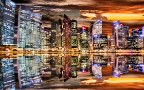 Beautiful city night, skyscrapers, lights, water reflection HD wallpaper