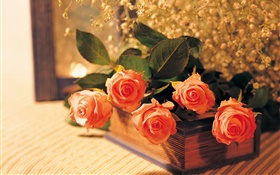 Orange roses and book