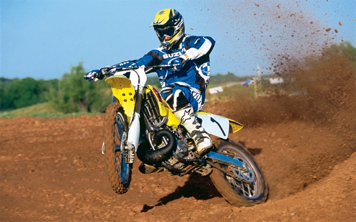 Suzuki motorcycle, racing, jumping Wallpapers Pictures Photos Images